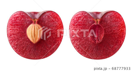 Isolated cherry halves with and without kernel Isolated cherry halves with and without kernel 68777933