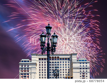 Fireworks over the facade of Four Seasons hotel (Hotel Moskva) from Manege Square. Moscow, Russia 68778054