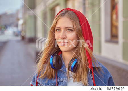 Young caucasian woman's street portrait. Young caucasian woman's street portrait. 68779092