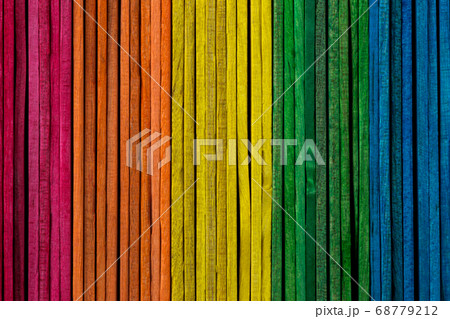 Coloured Wooden Sticks Stacked Side by Side Coloured Wooden Sticks Stacked Side by Side 68779212