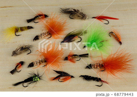 Trout Reservoir Lures on a Wooden Background 68779443