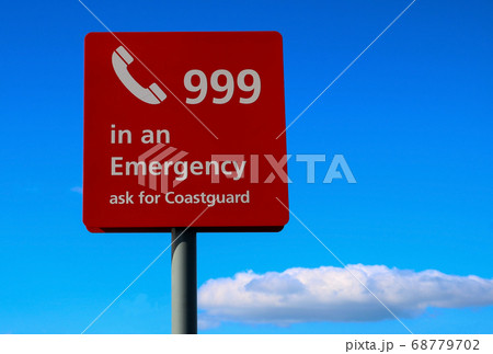 Emergency Sign at a Coastal Beach 68779702
