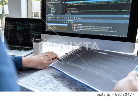Developer programmer working on project in 68780477