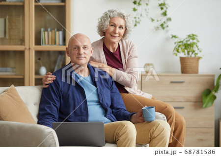 Modern Senior Couple Posing at Home Modern Senior Couple Posing at Home 68781586