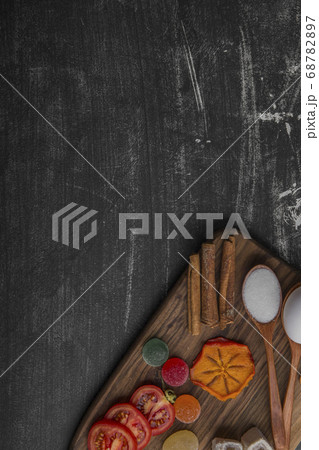 Snack board with chips, crackers and pastries  68782897
