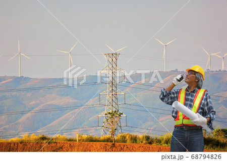electricity  pole get electric current from wind turbine transfer to home,town ,city 68794826