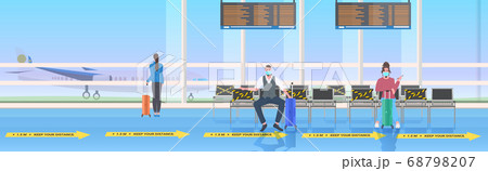 passengers keeping distance to prevent coronavirus social distancing concept airport terminal interior passengers keeping distance to prevent coronavirus social distancing concept airport terminal interior 68798207