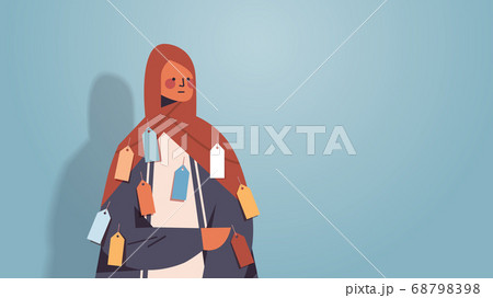 arab woman with colorful tags labels on wear inequality racial discrimination concept arab woman with colorful tags labels on wear inequality racial discrimination concept 68798398