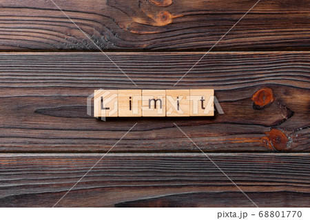 limit word written on wood block. limit text on limit word written on wood block. limit text on 68801770