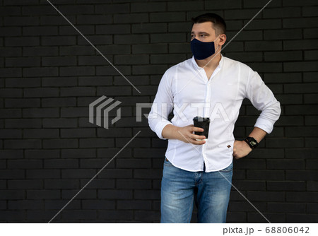 Businessman near office in protective cloth face Businessman near office in protective cloth face 68806042