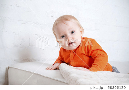 portrait of 1 white little girl in a red blouse on 68806120