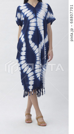 woman in indigo tie dye style dress woman in indigo tie dye style dress 68807701