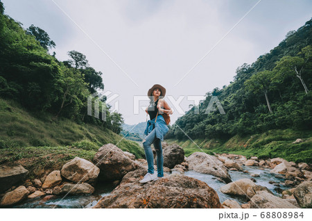 Traveler woman relaxing and enjoying view of Traveler woman relaxing and enjoying view of 68808984