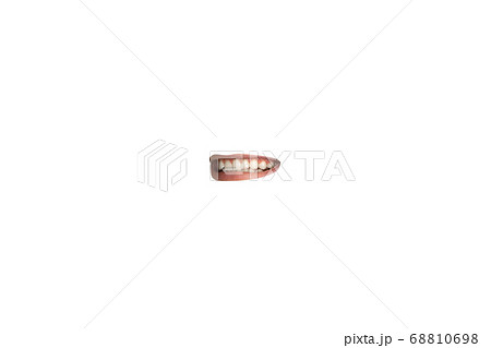 Close-up view of female mouth wearing lipstick isolated on white studio background Close-up view of female mouth wearing lipstick isolated on white studio background 68810698