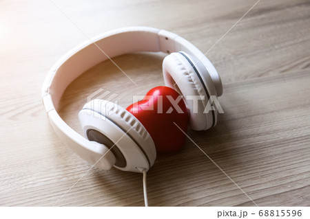 White headphones with red heart sign in the middle 68815596