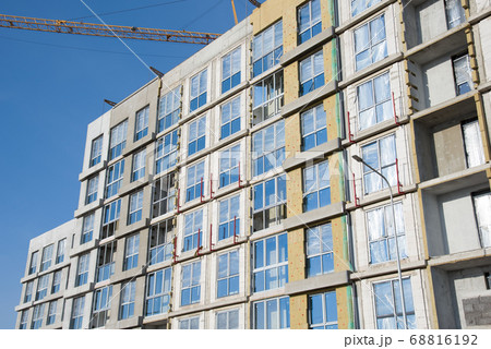 Mineral wool insulation of the facade building on construction site Mineral wool insulation of the facade building on construction site 68816192