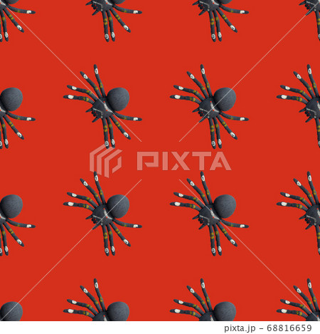 Seamless pattern with black spiders on a red background. Halloween theme. Simple drawing for any surface. Seamless pattern with black spiders on a red background. Halloween theme. Simple drawing for any surface. 68816659