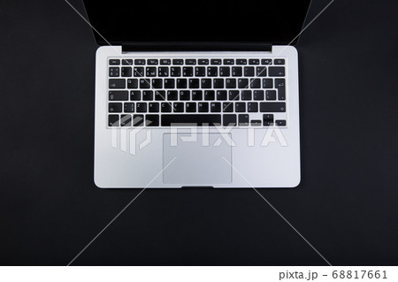 Black office desk with laptop.Top view with copy space for text input. Black office desk with laptop.Top view with copy space for text input. 68817661