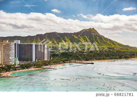 Hawaii vacation travel aerial view of Waikiki beach and Honolulu city with Diamond Head mountain in background. Urban landscape for USA travel summer vacation destination. 68821781