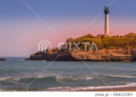 Beautiful colorful sunset in Biarritz view lighthouse sea background. 68822084