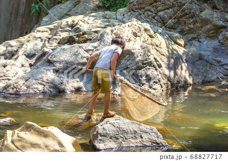 Boy fishing at the river in Sapa 68827717