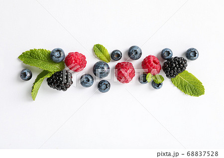Flat lay composition with berries on white Flat lay composition with berries on white 68837528