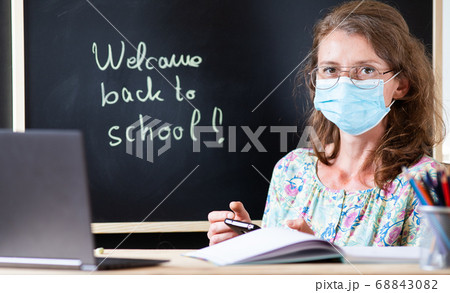 teacher wearing face mask back to school during 68843082