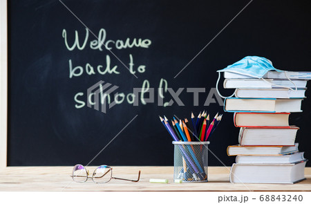 back to school concept during covid - pile of 68843240