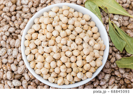 beans and chickpeas in porcelain bowl 68845093