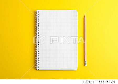 Clean copybook with pencil on color background, 68845374