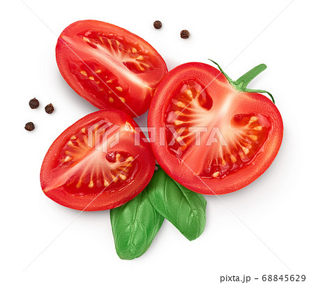 Tomato half and slices isolated on white background with clipping path and full depth of field. Top view. Flat lay 68845629