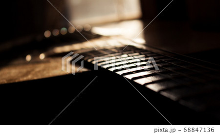 Acoustic Guitar In Music Studio Close up. Shined By The Sun Acoustic Guitar In Music Studio Close up. Shined By The Sun 68847136