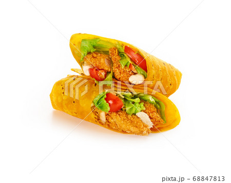 Mexican food. Fresh tortilla fajita wraps with chicken and vegetables Mexican food. Fresh tortilla fajita wraps with chicken and vegetables 68847813