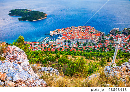 Dubrovnik, Croatia - Dalmatia Coast sunset with Ragusa ancient city Dubrovnik, Croatia - Dalmatia Coast sunset with Ragusa ancient city 68848418