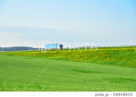 Truck with Semi-trailer driving along highway Truck with Semi-trailer driving along highway 68848650