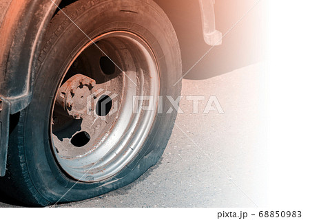 A flat tire of car A flat tire of car 68850983