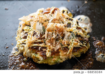 Okonomiyaki, japanese teppan-yaki pancake Okonomiyaki, japanese teppan-yaki pancake 68858384