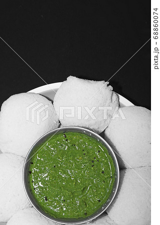 Idly served with Coriander mint Chutney for 68860074