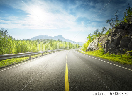 summer road in mountain, Lofoten islands, Norway summer road in mountain, Lofoten islands, Norway 68860370