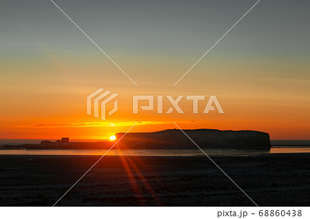 Winter landscape, oceanic beach with black 68860438