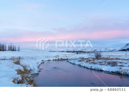 River on the plain in Iceland. The banks are 68860531