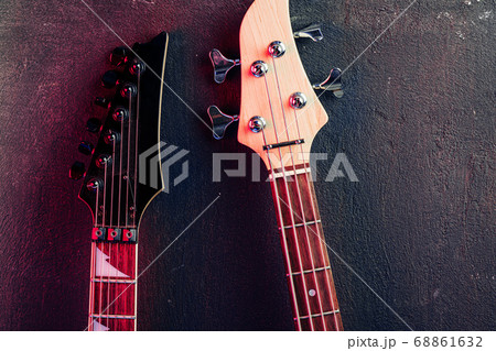 Guitar headstock with tuners on dark background Guitar headstock with tuners on dark background 68861632