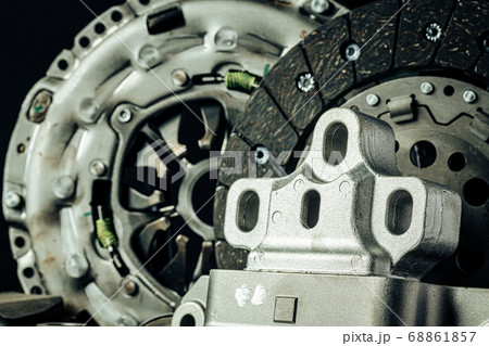 Close up of new car parts on black background 68861857