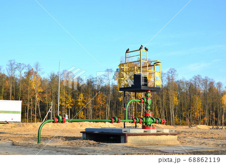 Industrial piping with steel flanges and bolts on oil field Industrial piping with steel flanges and bolts on oil field 68862119