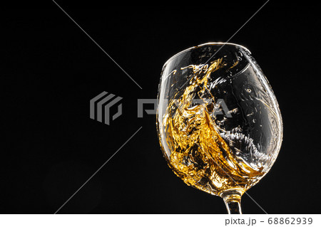 Glass of wine on black background, close up 68862939