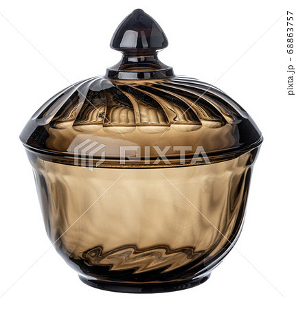 Dark empty glass sugar bowl isolated on white Dark empty glass sugar bowl isolated on white 68863757