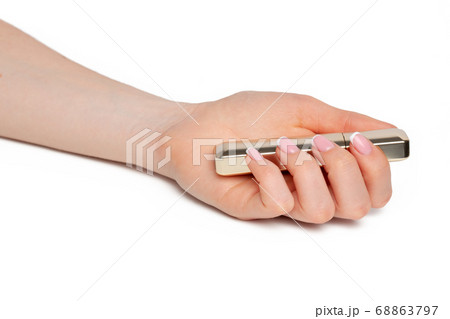 Female hand with manicure holding gold mascara tube Female hand with manicure holding gold mascara tube 68863797