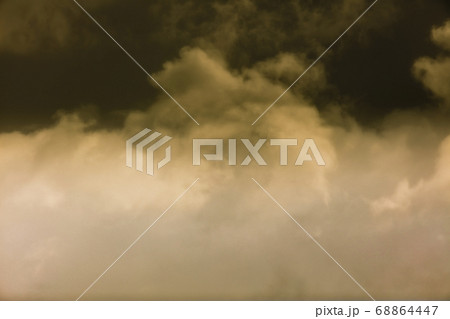 High level clouds in the sky during a rain storm. High level clouds in the sky during a rain storm. 68864447