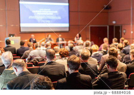 Round table discussion at business conference event. Round table discussion at business conference event. 68884016