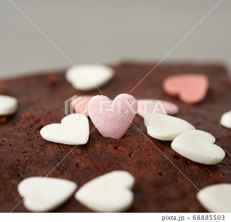 heart-shaped sugar topping on brownie chocolate 68885503